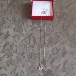 Never worn necklace with lock and key pendants in gift box